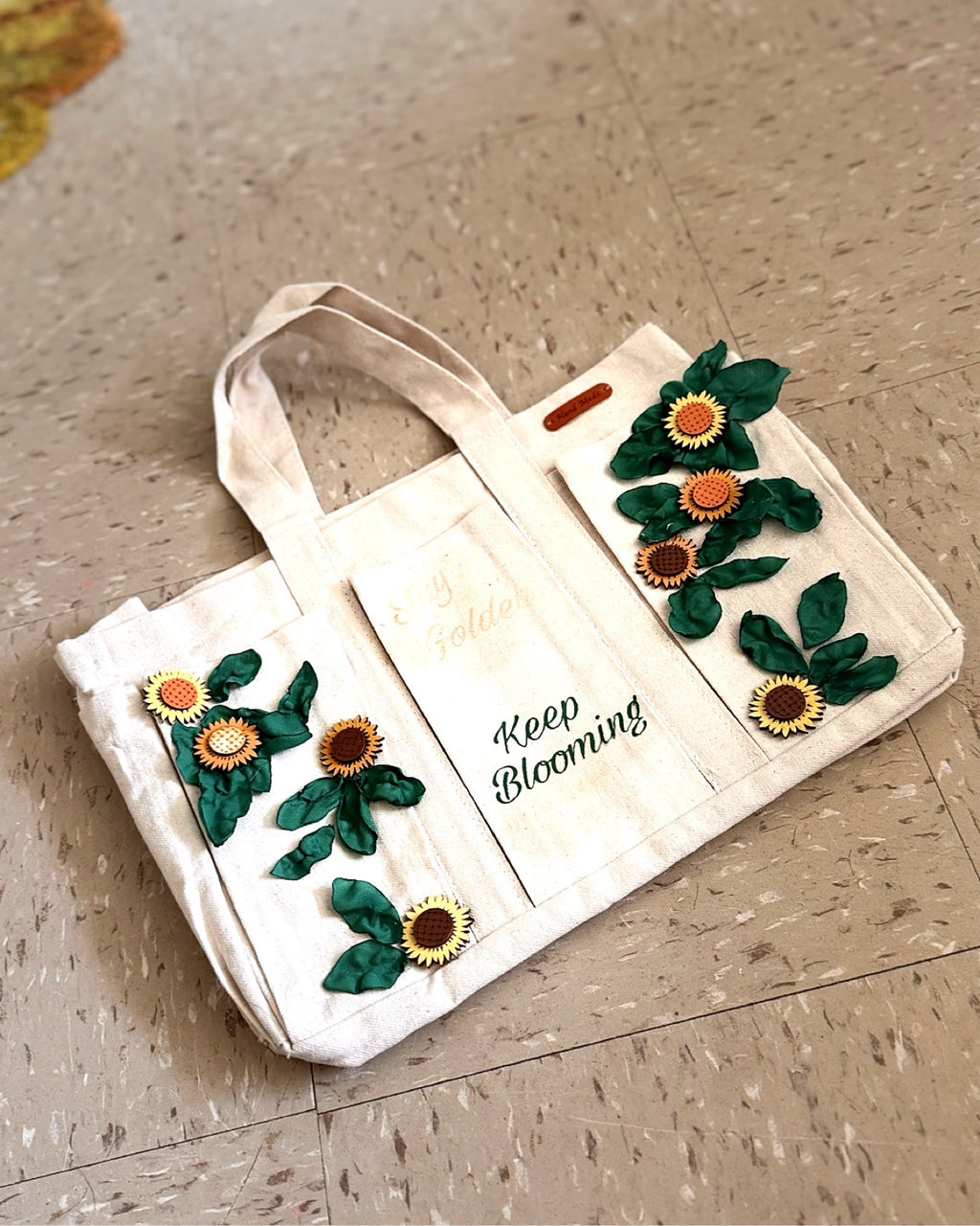 Keep Blooming Sunflower Tote — flat lay view