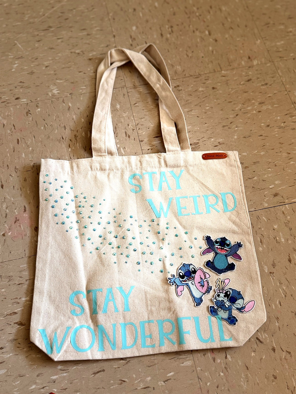 Stay Weird Stay Wonderful Tote — flat lay view